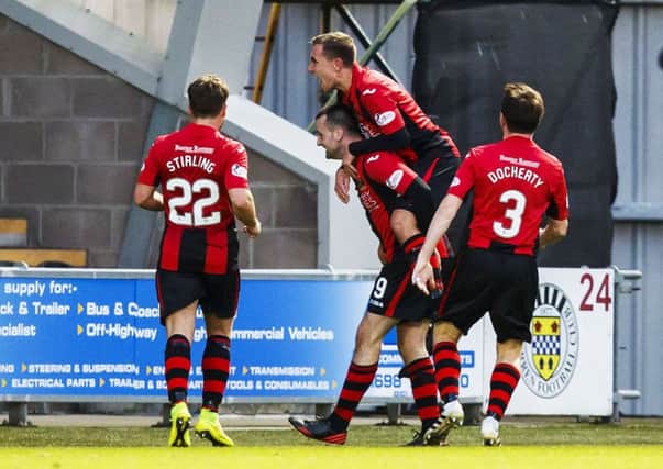 Dumbarton's Garry Fleming (9) celebrates after he scores his side's goal. Picture: Roddy Scott/SNS