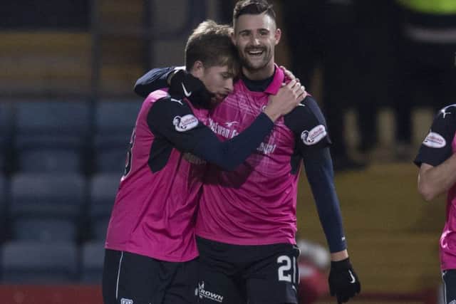 Dundee's Marcus Haber, right, celebrates his clinching goal with Craig Wighton during the win over Motherwell. Picture: SNS