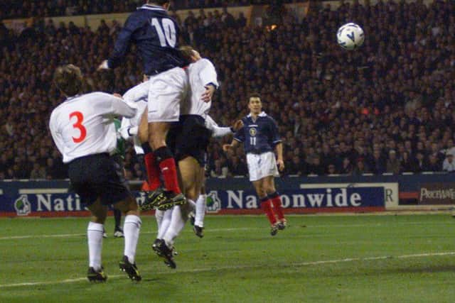 Don Hutchison rises above the English defence to score the winning goal for Scotland in the second leg of their Euro 2000 play-off against England in 1999. Picture: Donald MacLeod/TSPL