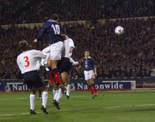 Don Hutchison rises above the English defence to score the winning goal for Scotland in the second leg of their Euro 2000 play-off against England in 1999. Picture: Donald MacLeod/TSPL