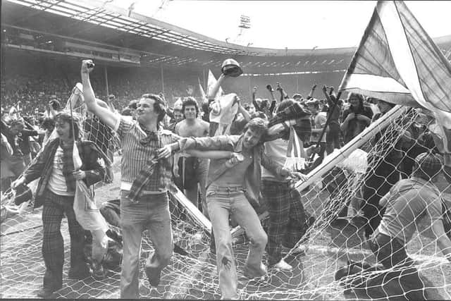 Scotland tear down the Wembley goalposts in celebration after a famous 2-1 victory in 1977. Picture: Denis Straughan/TSPL