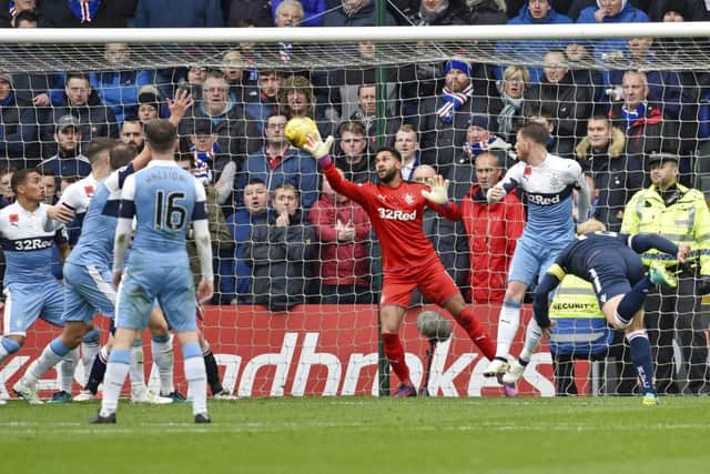 Andrew Davies scores the equaliser for Ross County. Picture: SNS.