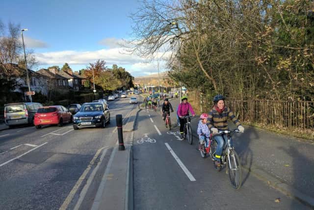 Cyclists taking part in today's "advocacy ride" along the Bears Way segregated cycle lane on the A81