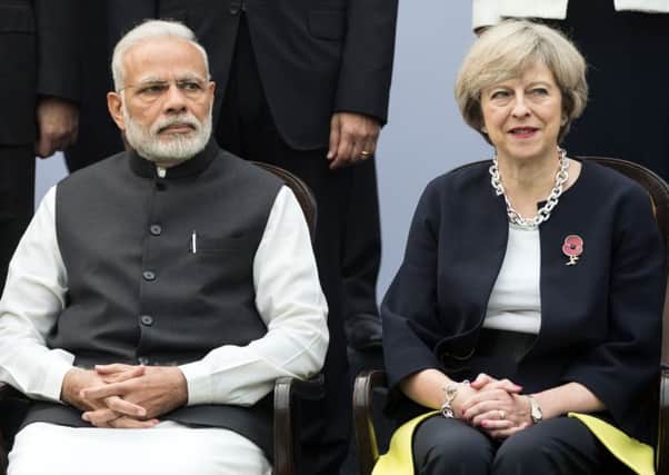 British Prime Minister Theresa May and  Indian Prime Minister Narendra Modi.(Photo by Dan Kitwood/Getty Images)