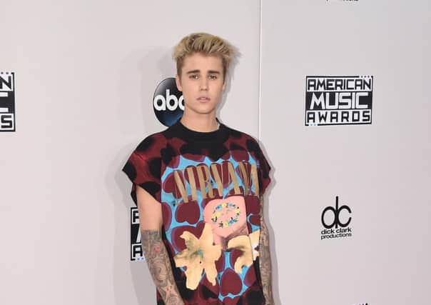 Justin Bieber attends the 2015 American Music Award.(Photo by Jason Merritt/Getty Images)