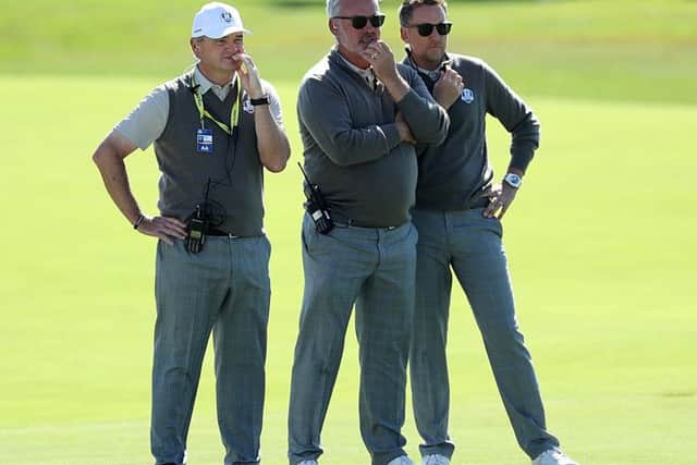 European Ryder Cup captain Darren Clarke, centre, with vice-captains Paul Lawrie, left, and Ian Poulter at Hazeltine. Picture: David Cannon/Getty Images