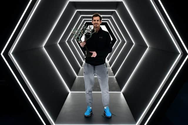 Andy Murray with the  'Tree of Fanti' trophy after winning the BNP Paribas Masters  on Sunday.