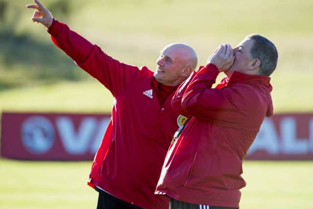 Scotland coach Andy Watson, left, and assistant manager Mark McGhee during a training session with the squad at Mar Hall yesterday. Picture: Rob Casey/SNS