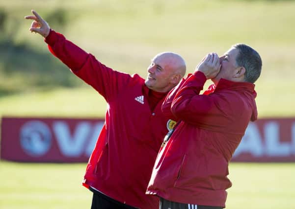 Scotland coach Andy Watson, left, and assistant manager Mark McGhee during a training session with the squad at Mar Hall yesterday. Picture: Rob Casey/SNS
