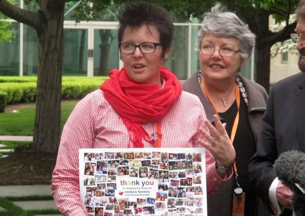 A gay rights advocate outside Parliament House in Canberra. Picture: AP