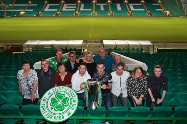 Magners Employability Project course participants Colin Brodie, Dale McFadden, David Kelly, June Gilmore, Stephen Johnson, Connor Roberton, Denise Wu, Carolyn Martin, Jackie Waddell, Lian Fern and George Bennett, with Celtic players Calum McGregor and Patrick Roberts. Picture: Contributed