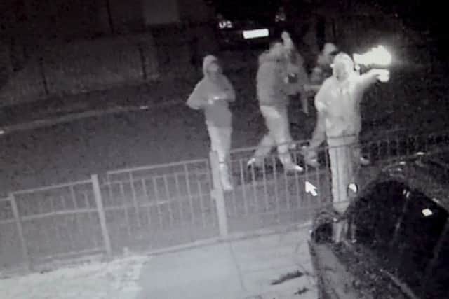 CCTV footage shows yobs attacking Able Miller at his home with fireworks and bricks. Picture: SWNS
