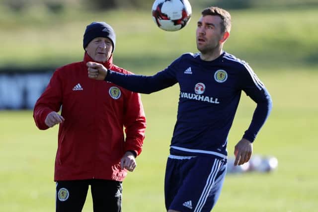 Scotland manager Gordon Strachan and James McArthur during training. Picture: Andrew Milligan/PA Wire