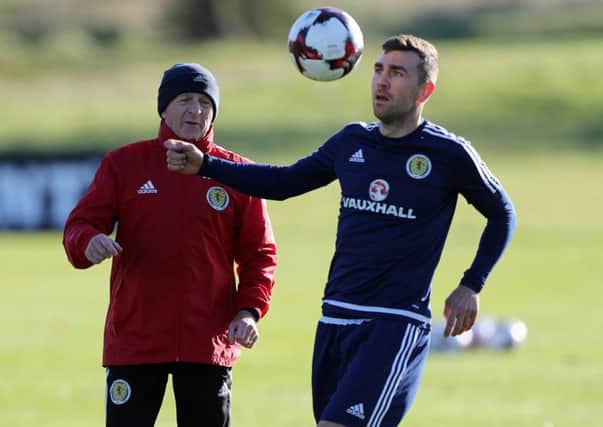 Scotland manager Gordon Strachan and James McArthur during training. Picture: Andrew Milligan/PA Wire