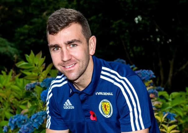 James McArthur wants to wear a poppy 'out of respect' in Scotland's clash with England on Friday. Pic: SNS