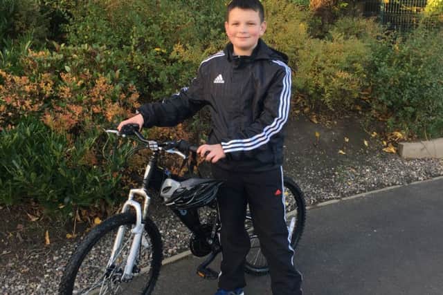 Logan Thomson will cycle across the Forth Road Bridge 14 times in aid of Poppyscotland. Picture: Contributed