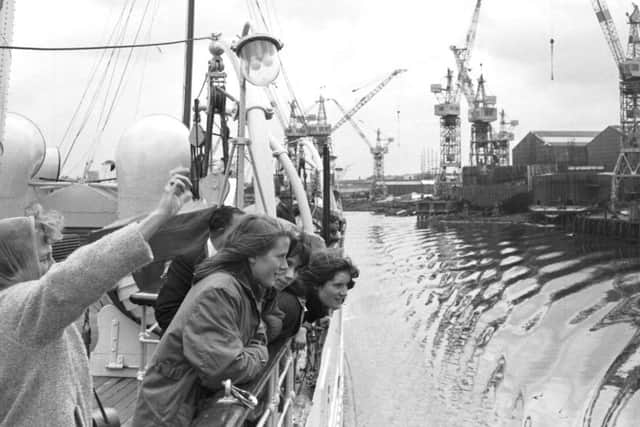 Glasgow holidaymakers on board the Queen Mary II steamer take a trip down the River Clyde in July  PIC: TSPL