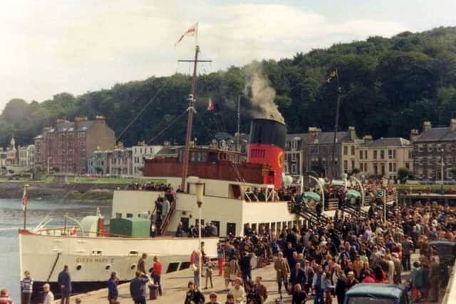 The Queen Mary II pulls into Rothesay for a Highland Games weekend during the 1970s. PIC  Kenneth Whyte/ www.paddlesteamers.info