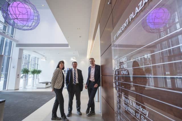 KPMG's senior team in Scotland check out the firm's new offices at St Vincent Plaza in Glasgow. Picture: Contributed