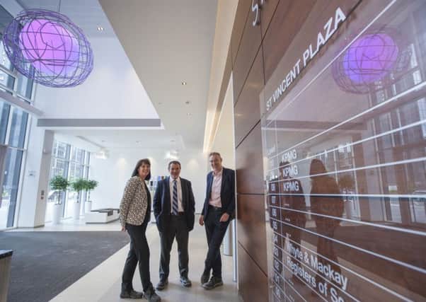 KPMG's senior team in Scotland check out the firm's new offices at St Vincent Plaza in Glasgow. Picture: Contributed