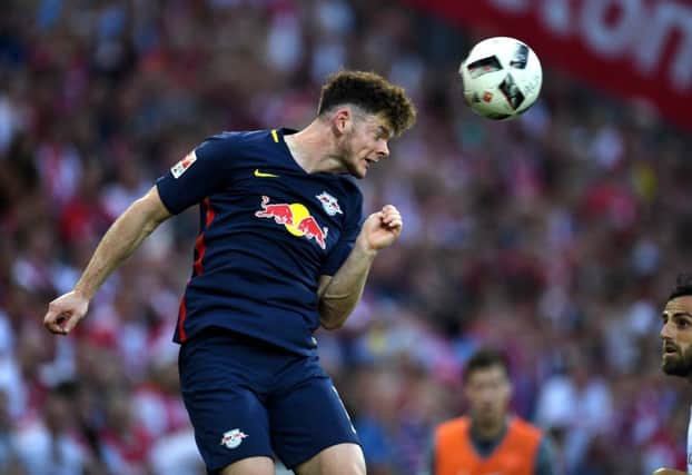 Leipzig´s midfielder Oliver Burke vies for the ball during the German first division Bundesliga football match of 1 FC Cologne vs RB Leipzig in Cologne, western Germany, on September 25, 2016. / AFP / PATRIK STOLLARZ / RESTRICTIONS: DURING MATCH TIME: DFL RULES TO LIMIT THE ONLINE USAGE TO 15 PICTURES PER MATCH AND FORBID IMAGE SEQUENCES TO SIMULATE VIDEO. == RESTRICTED TO EDITORIAL USE == FOR FURTHER QUERIES PLEASE CONTACT DFL DIRECTLY AT + 49 69 650050
(Photo credit should read PATRIK STOLLARZ/AFP/Getty Images)