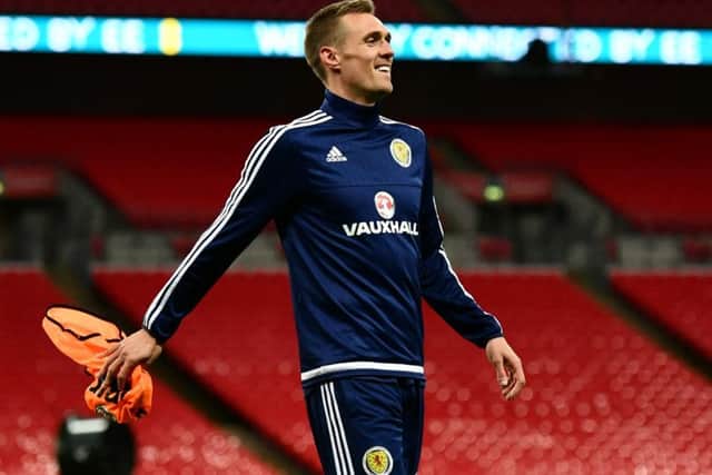 Scotland captain Darren Fletcher smiles during a training session at Wembley ahead of the World Cup qualifier against England. Picture: Dan Mullan/Getty Images
