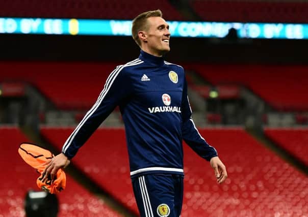 Scotland captain Darren Fletcher smiles during a training session at Wembley ahead of the World Cup qualifier against England. Picture: Dan Mullan/Getty Images