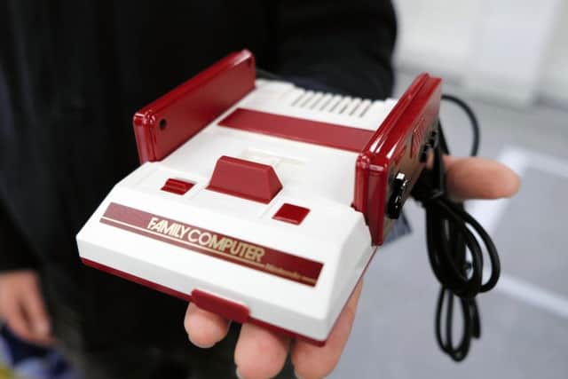 Ahead of the launch of its Switch console, Nintendo has scored a success with the remake of its 1980s Family Computer. Picture: The Asahi Shimbun via Getty Images
