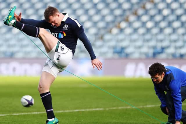 Stuart Hogg goes through his kicking drills during the captain's run at BT Murrayfield. Picture: Ian MacNicol/Getty Images