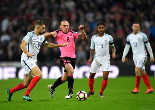 Scott Brown made his international comeback but could not stop Scotland losing 3-0 to England at Wembley.  Picture: Shaun Botterill/Getty Images