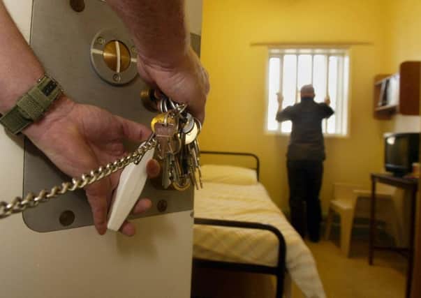 Offenders taken into police custody are to be screened for brain injuries. Pictures: Paul Faith/PA Wire