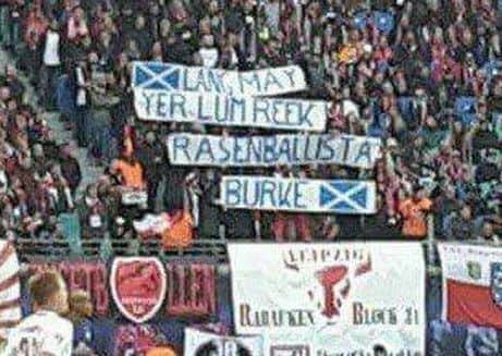 The banner was for Oliver Burke and stated: "Lang may yer lum reek" but the winger confessed he didn't know what it meant.