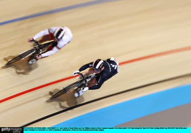 Jack Carlin (white) of Great Britain and Zac Williams of New Zealand compete in the Men's Sprint during the Tissot UCI Track Cycling World Cup. Picture: Dean Mouhtaropoulos/Getty