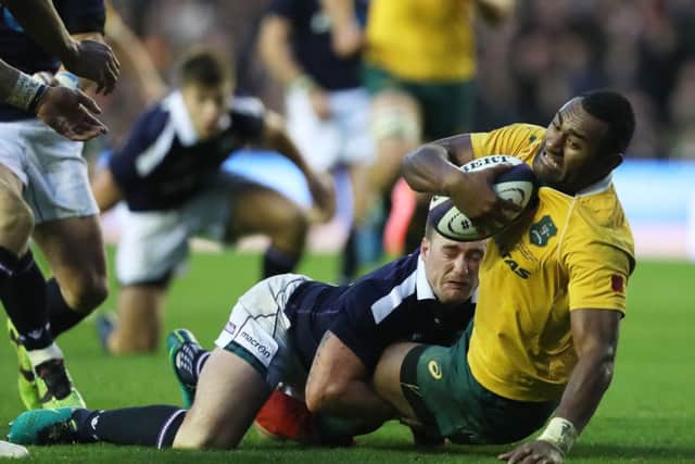 Stuart Hogg cant stop Tevita Kuridrani scoring Australia's late try. Picture: Getty.
