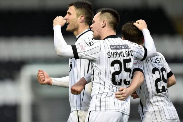 John Sutton, left, celebrates his winning goal for St Mirren. Picture: SNS.