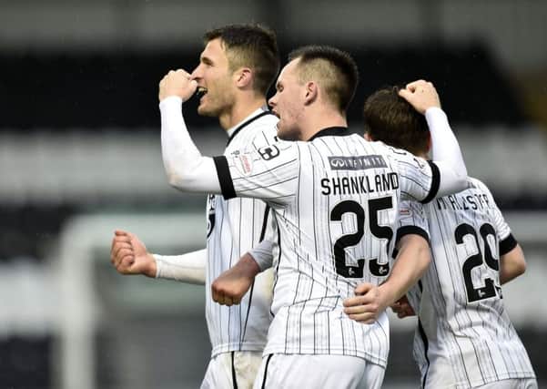 John Sutton, left, celebrates his winning goal for St Mirren. Picture: SNS.