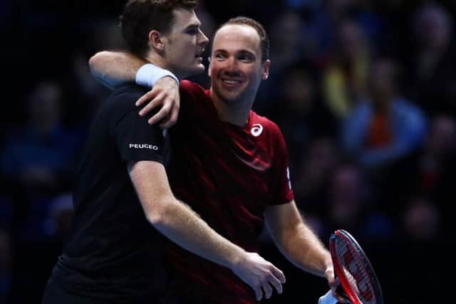Jamie Murray, left, and  Bruno Soares celebrate victory in their doubles match against Treat Huey  and Max Mirnyi. Getty.