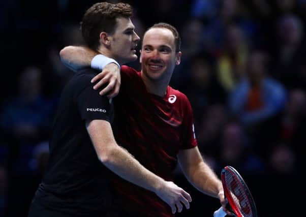 Jamie Murray, left, and  Bruno Soares celebrate victory in their doubles match against Treat Huey  and Max Mirnyi. Getty.