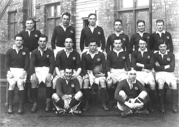 GPS Macpherson (centre, holding the ball) and the 1925 Scottish Grand Slam winning side. Picture: Scottish Rugby