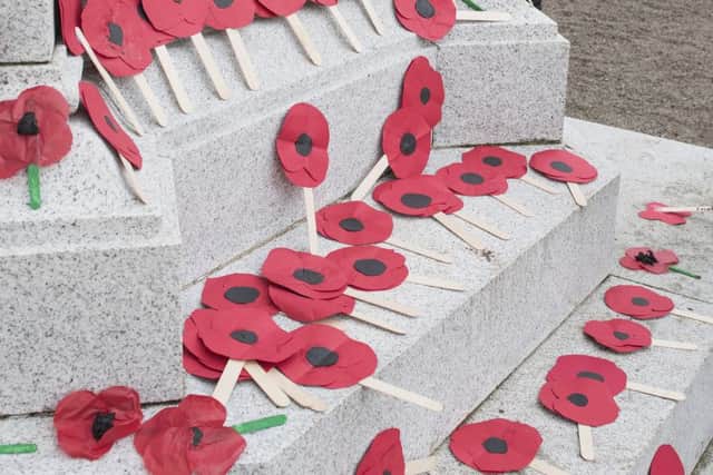 England and Scotland players wore poppies on black armbands during the match