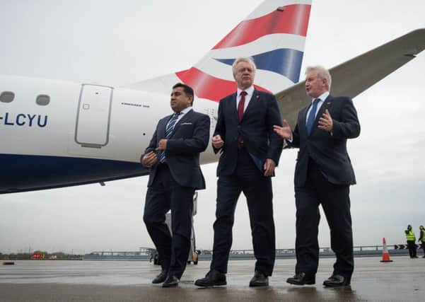 British Secretary of State for Exiting the European Union (Brexit Minister) David Davis walks with Aviation Minister Lord Ahmad  and Chief Executive of London City Airport. Picture: Declan Collier  / AFP PHOTO / POOL / Stefan Rousseau