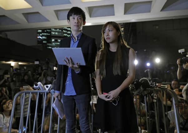 Hong Kong politicians Sixtus Leung and Yau Wai-ching have said they will appeal the decision rather than enter by-elections. PIcture: AP