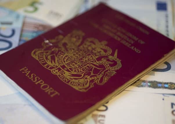 Holyrood are examining plans for a Scottish passport. Picture: John Devlin