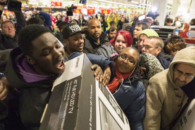 Black Friday may not always generate the bargains shoppers think it does. Picture: Ray Tang/REX/Shutterstock