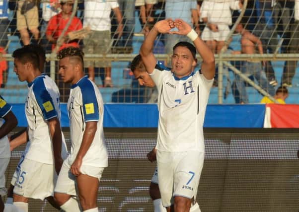 Emilio Izaguirre celebrates after scoring for Honduras against Trinidad & Tobago. Picture: AFP/Getty Images