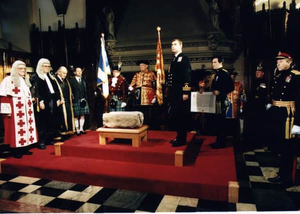 Prince Andrew standing beside the Stone of Destiny at the  return ceremony at Edinburgh Castle in 1996. Picture: Hamish Campbell/TSPL