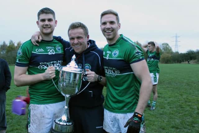 Manager Cormac O'Gara, centre, with Robbie Howe (left) and club captain Brian McAteer. Picture: Mairead Keating