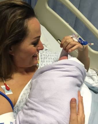 Victoria Fritz holds her new baby in a picture tweeted by BBC Breakfast
