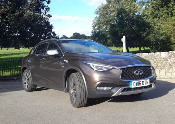The Infiniti QX30 has kudos when you step in, while its body is all swoops and curves and the bonnet edge has an unusual chromed lip over the mesh grille.