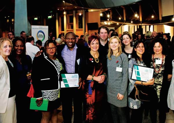 The competition winners with Angela Constance at the Scottish Parliament. Picture: Becky Duncan